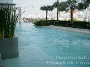 Condo for sale in Bangkok close to Lumpini MRT. Brand new 83 sq.m. 2 bedroom fully furnished. Nice view of the city